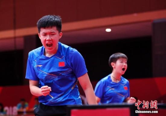 資料圖：雅加達(dá)亞運(yùn)會(huì)，王楚欽/孫穎莎奪得混雙冠軍。 <a target='_blank' href='/'>中新社</a>記者 劉關(guān)關(guān) 攝