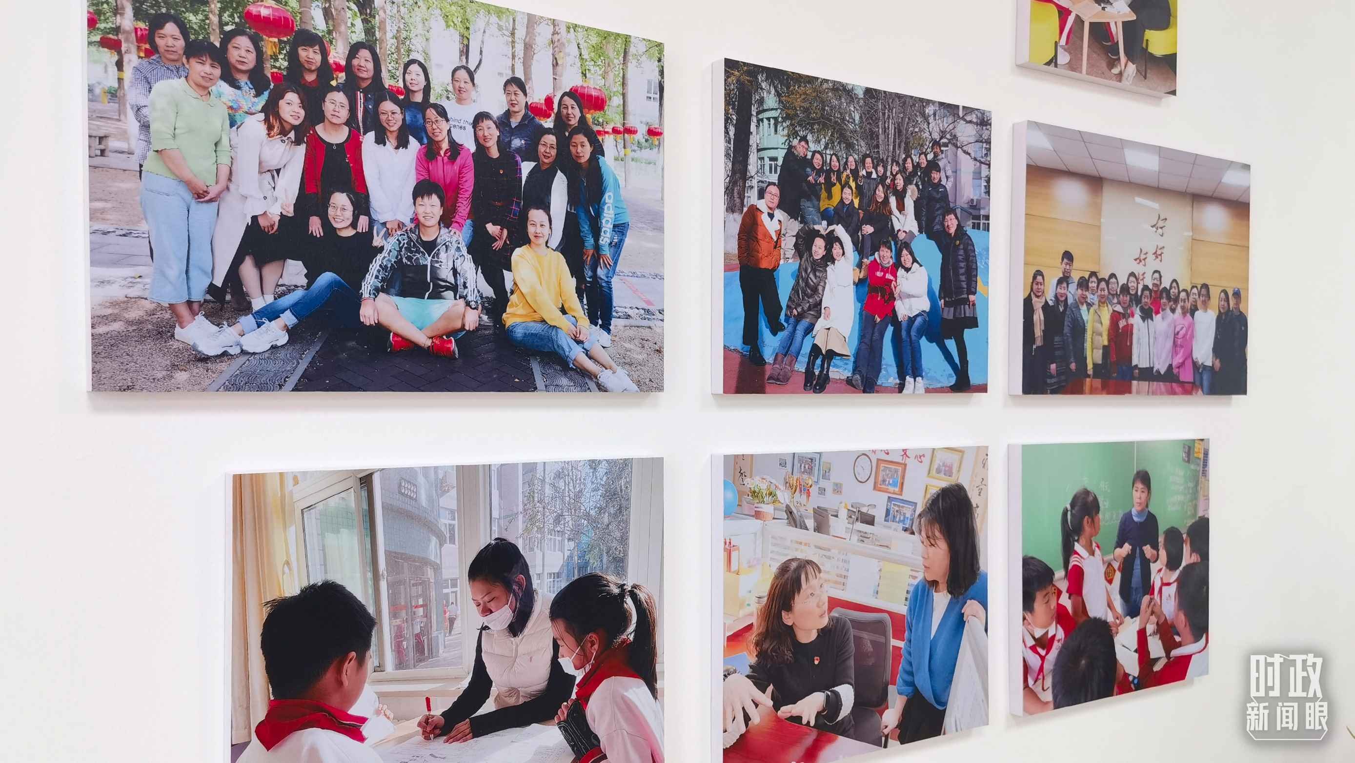 △五年級教師辦公室內(nèi)的合影展板。（總臺央視記者賈林拍攝）