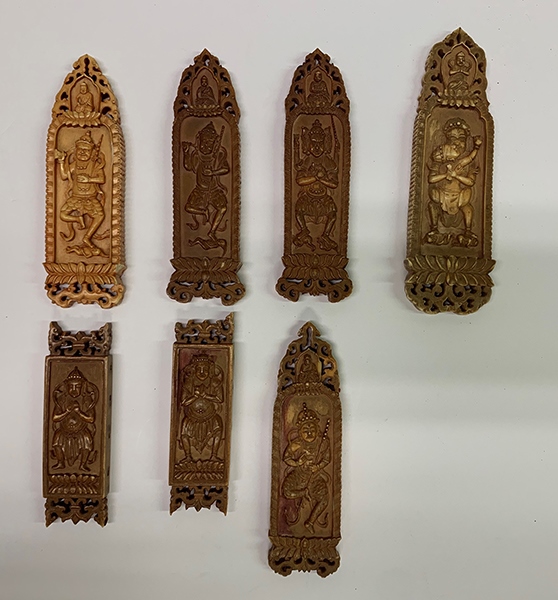 木雕牌飾（暫定名）。國家文物局供圖