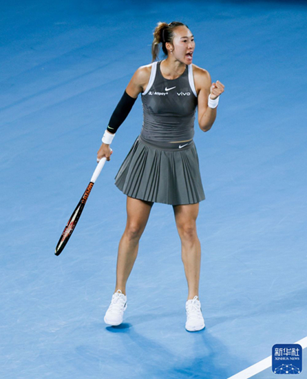 鄭欽文在比賽中慶祝得分。新華社記者 馬平 攝