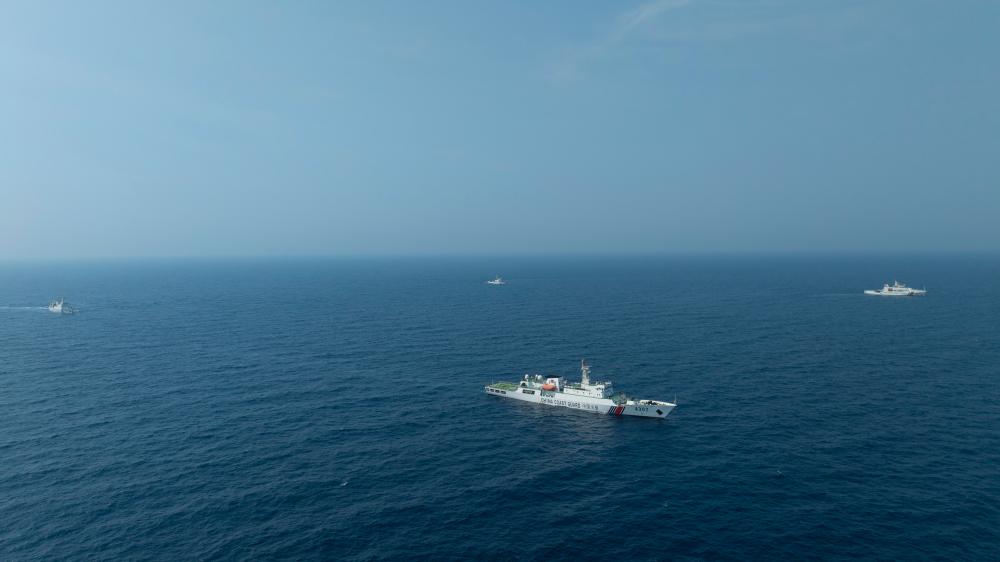 4月22日，中越海警艦艇編隊在北部灣海域開展聯(lián)合巡邏。（中國海警供圖）